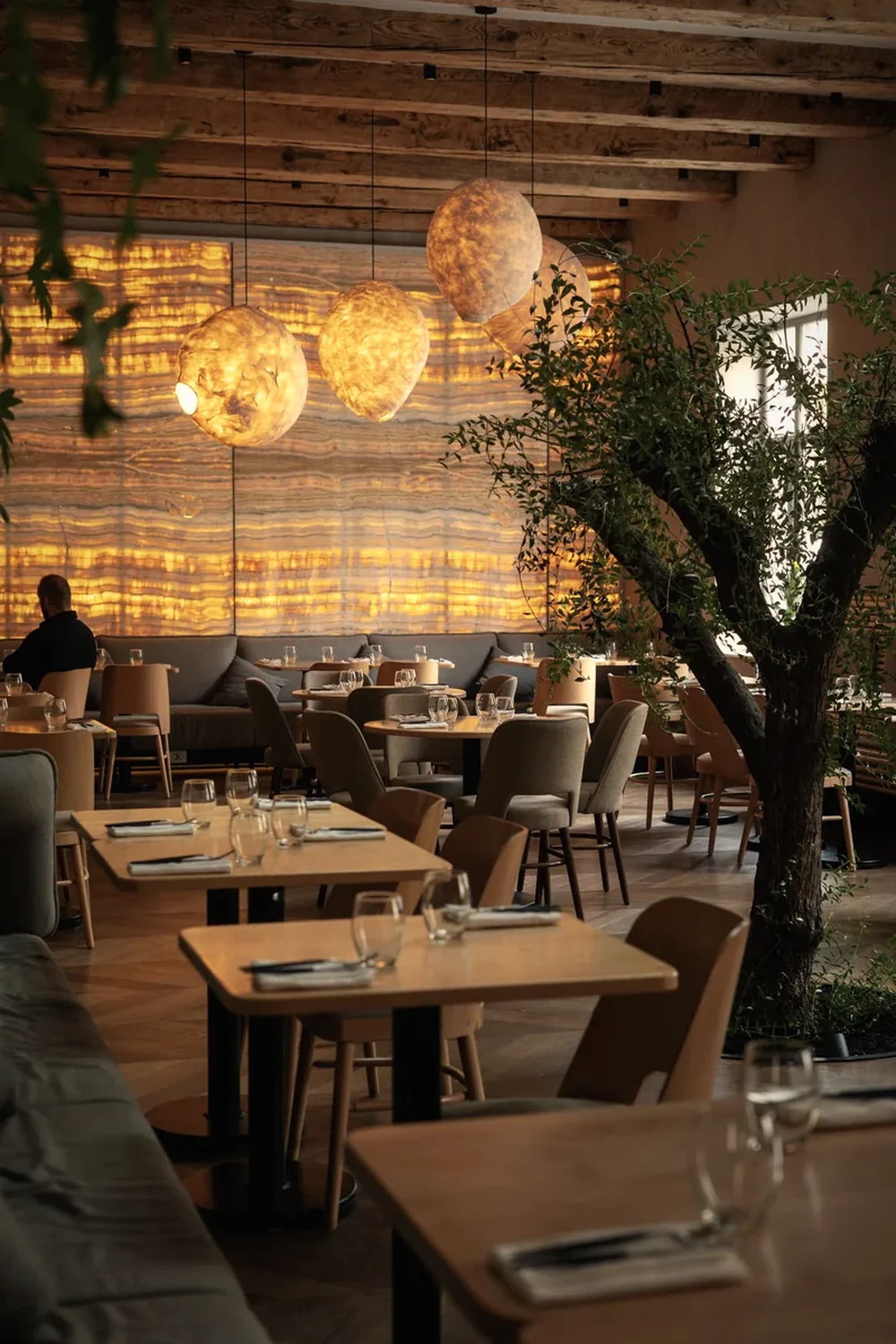 Commercial real estate photographer Melbourne — a fitted-out hospitality venue with feature lighting, timber and stone finishes, photographed for a leasing campaign